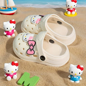 Babuche Infantil Feminino Hello Kitty Laço Mule Furado Antiderrapante Rosa e Bege Numeração 19 ao 30